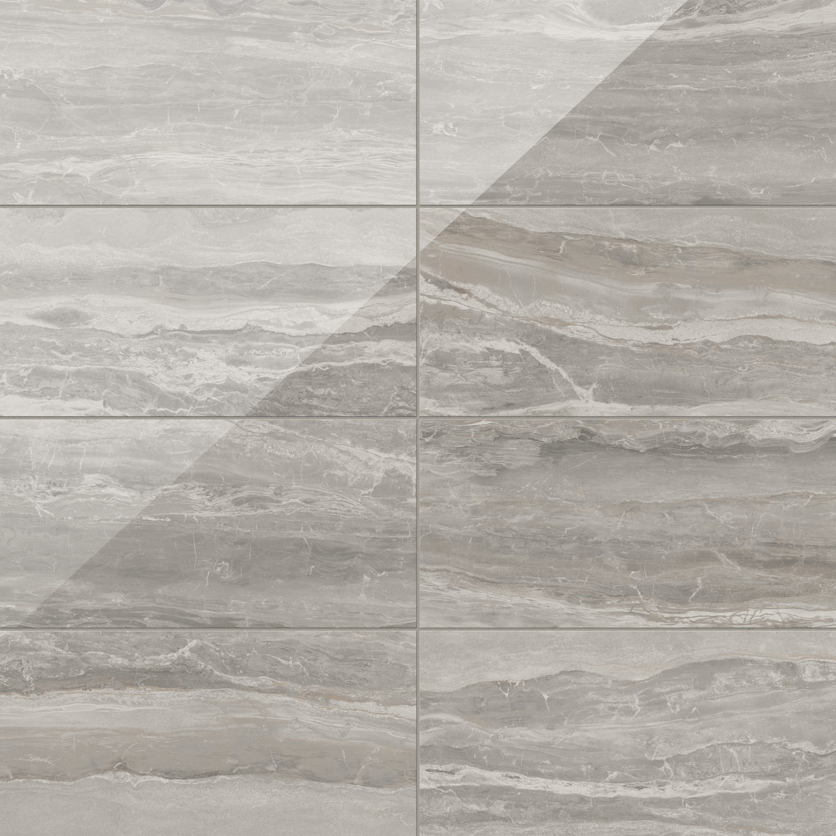 Featuring polished brown surfaces and striking natural veining, these 12x24 tiles combine smoothness and subtle earthy tones, making them ideal for creating a refined and timeless interior style.