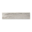 A detailed look of Harley Greige 3x12 polished bullnose tile showcasing soft beige and taupe tones and subtle veining, perfect for achieving a seamless, sophisticated edge finish.