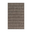 Textured indoor/outdoor rug with a geometric honeycomb pattern in mid gray and black tones, adding warmth and visual rhythm to modern spaces.