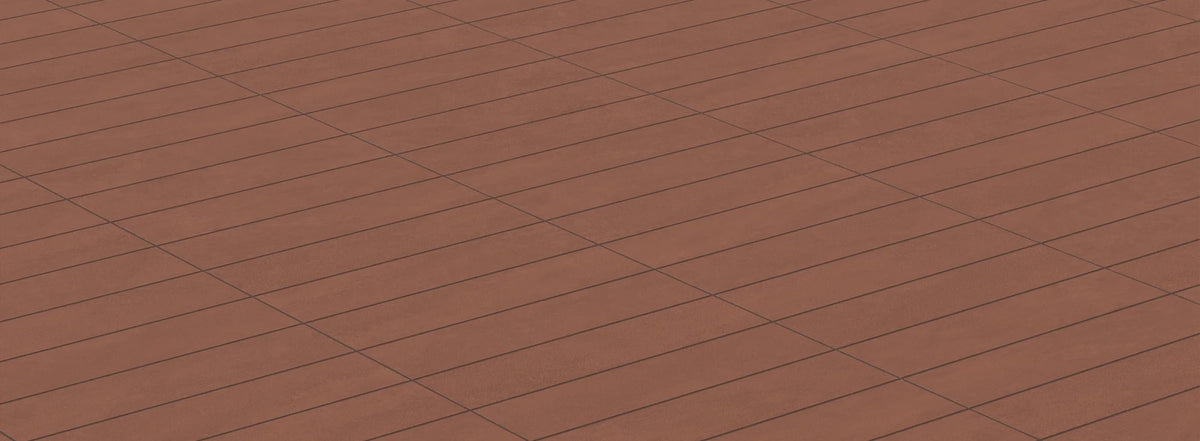 Deep red tile with a matte finish paves the way for a bold and warm flooring statement
