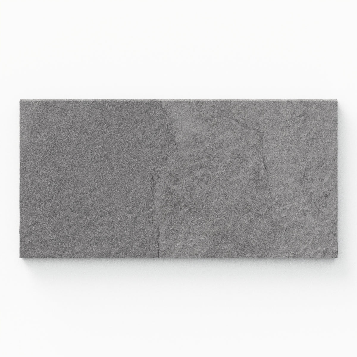Bowden 12x24 Grip Porcelain 2cm Coping in Graphite, showcasing a deep gray tone with a textured surface for refined outdoor spaces.