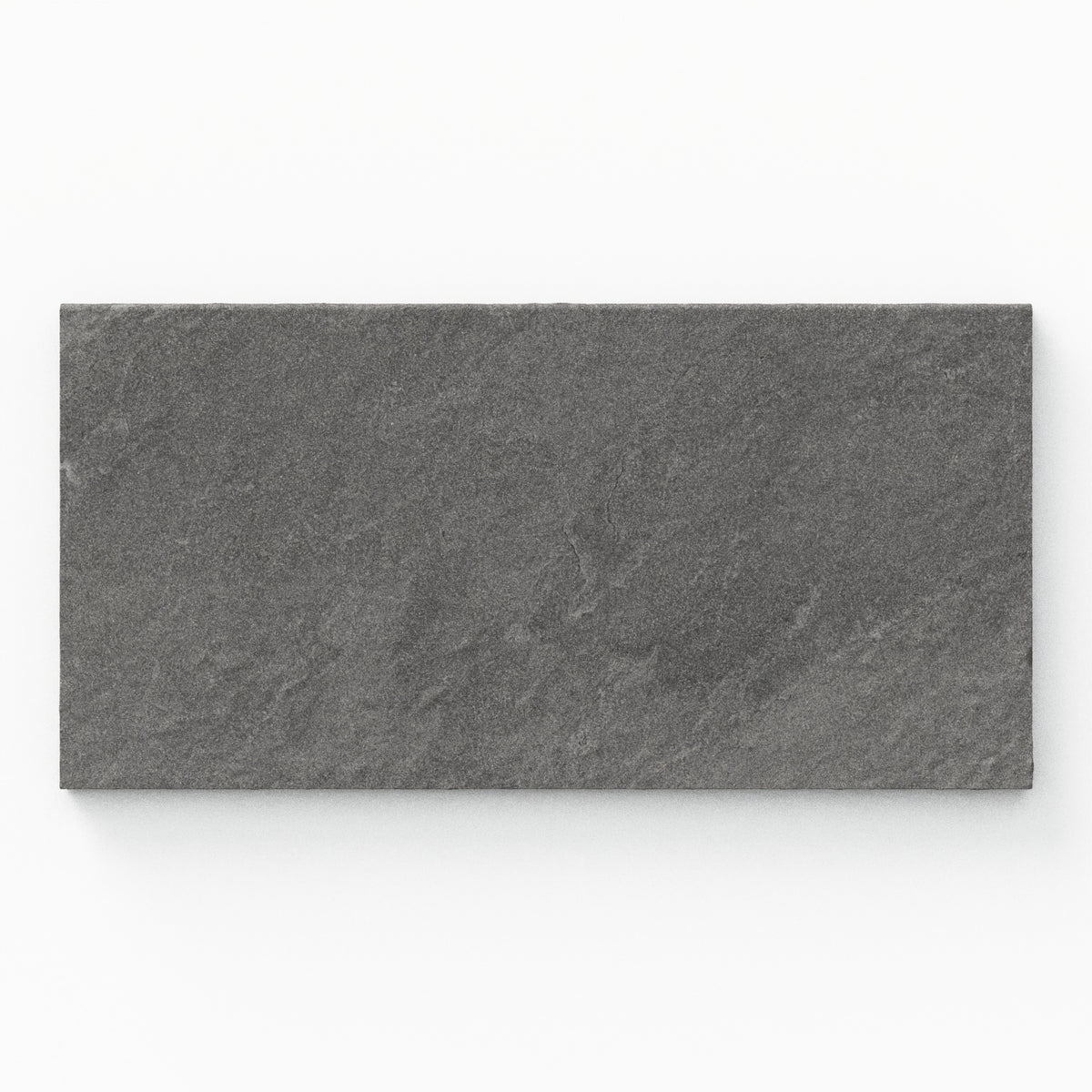 Bowden 12x24 Grip Porcelain 2cm Coping in Charcoal, showcasing rich dark gray tones with a textured finish for sleek outdoor elegance.
