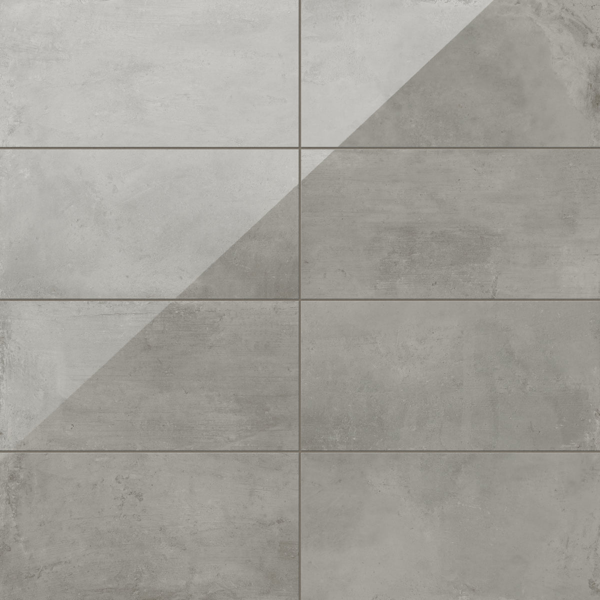 12x24 porcelain tiles combining light brown and medium gray tones with a sleek, polished concrete finish for modern sophistication