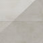 Polished off-white to light gray 24x48 tile with subtle beige undertones, offering a clean and modern concrete-like aesthetic
