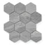 Matte hexagonal tiles in a sleek iron grey hue, highlighted by subtle natural veining, bring a refined modern touch.