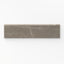 Leona Amani Bronze 3x12 bullnose matte tile featuring warm bronze hues and subtle veining for an elegant finish.