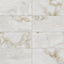 Astrid 12x24 matte porcelain tile in Pearl, showcasing its luminous white tones with soft golden veining for a luxurious look.