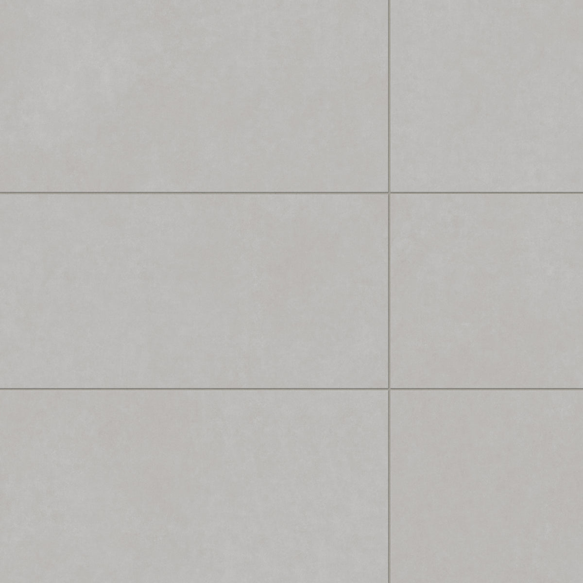 Soft gray Wyatt 16x32 matte porcelain tiles, offering a subtle textured finish with foggy undertones for a clean and modern aesthetic.