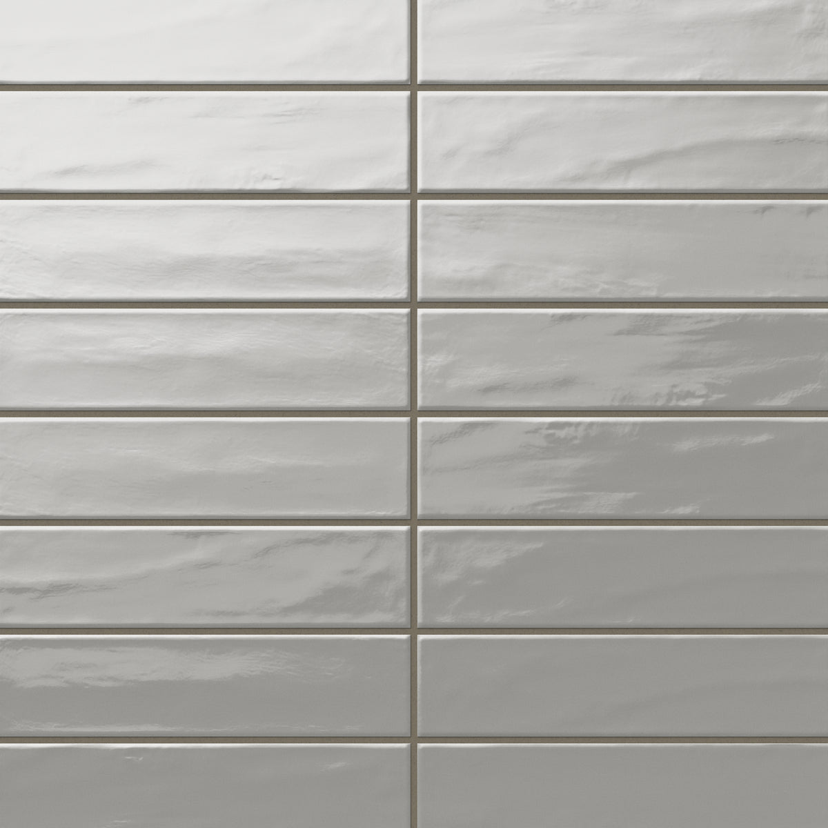 Palmer 3x12 glossy porcelain tile in smoke, offering a refined gray tone with a glossy sheen for sleek interior designs.