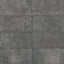 Sloane 12x24 matte porcelain tile in Charcoal, showcasing a textured surface with subtle speckling, ideal for creating a modern, industrial aesthetic.