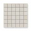 Close-up view of Sloane Pearl 2x2 matte tiles, highlighting their soft cream tone with delicate speckled details for a refined finish.