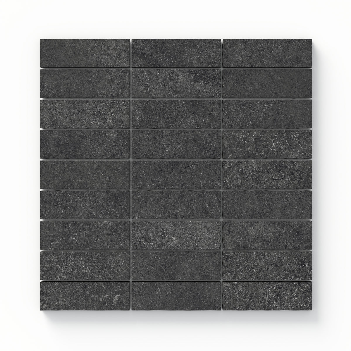 Adeline Midnight 1x4 matte mosaic tiles showcasing a rich, dark tone with subtle variations for a bold and modern aesthetic.