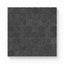 A close-up of Adeline Midnight 1.5x1.5 Matte mosaic tiles, showcasing their deep black tone, textured surface, and seamless grid arrangement.