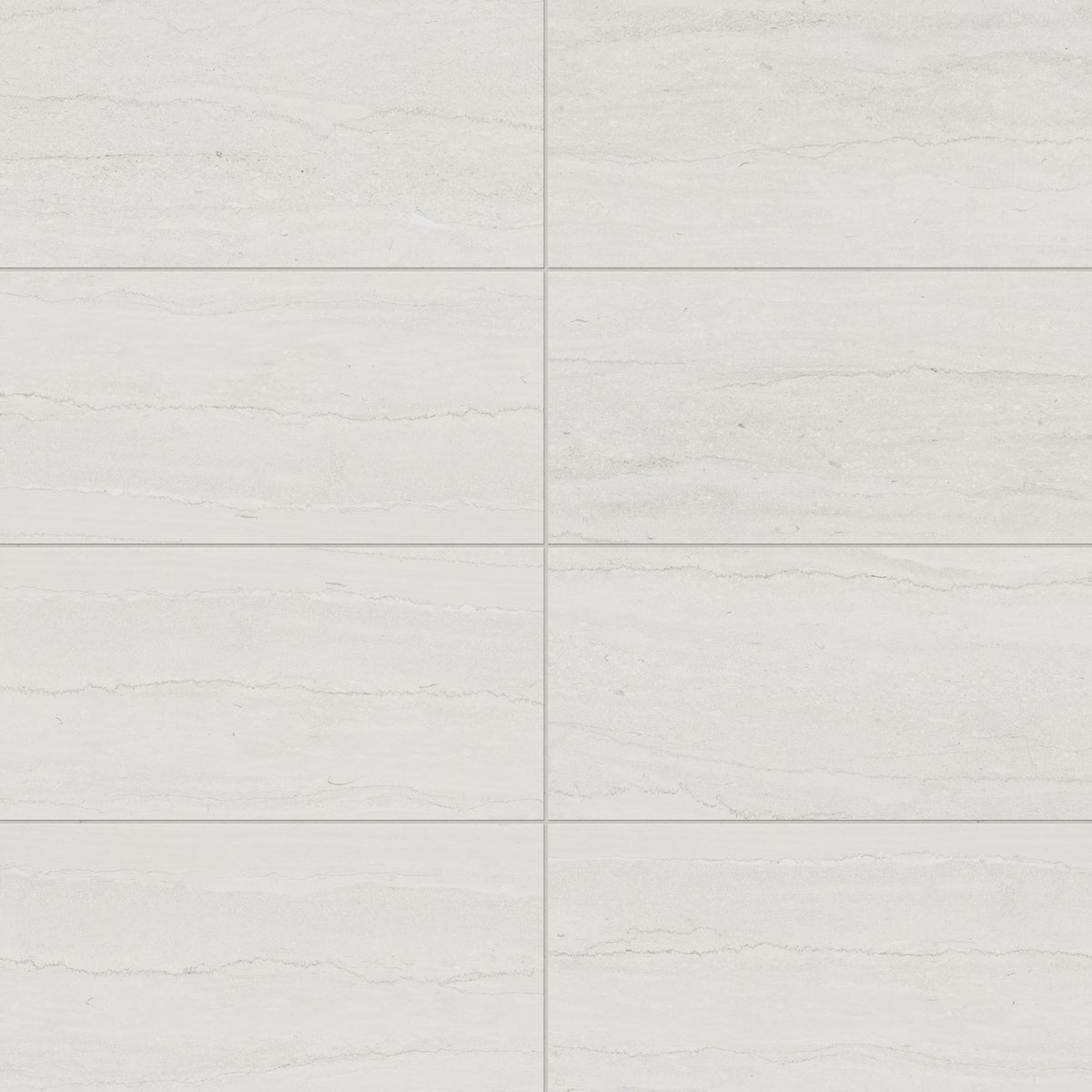 Bright 12x24 matte porcelain tiles in an airy off-white tone with a vein-cut design, offering a clean and sophisticated look for modern spaces.