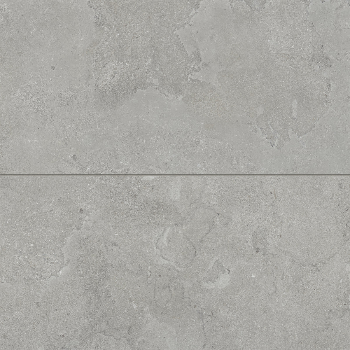 Large-format matte porcelain tiles in a soft ash grey tone, featuring intricate cross-cut patterns for a refined, natural stone appearance.