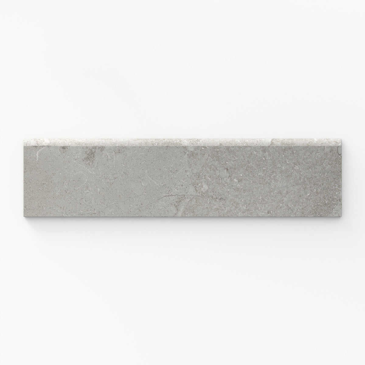A soft dune taupe matte porcelain bullnose tile, sized at 3x12, featuring a cross-cut design, perfect for creating smooth, polished edges with a natural, elegant finish.