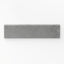 A rich pewter gray matte porcelain bullnose tile, measuring 3x12, featuring a cross-cut design, designed to provide seamless edge finishes with a contemporary, sophisticated touch.