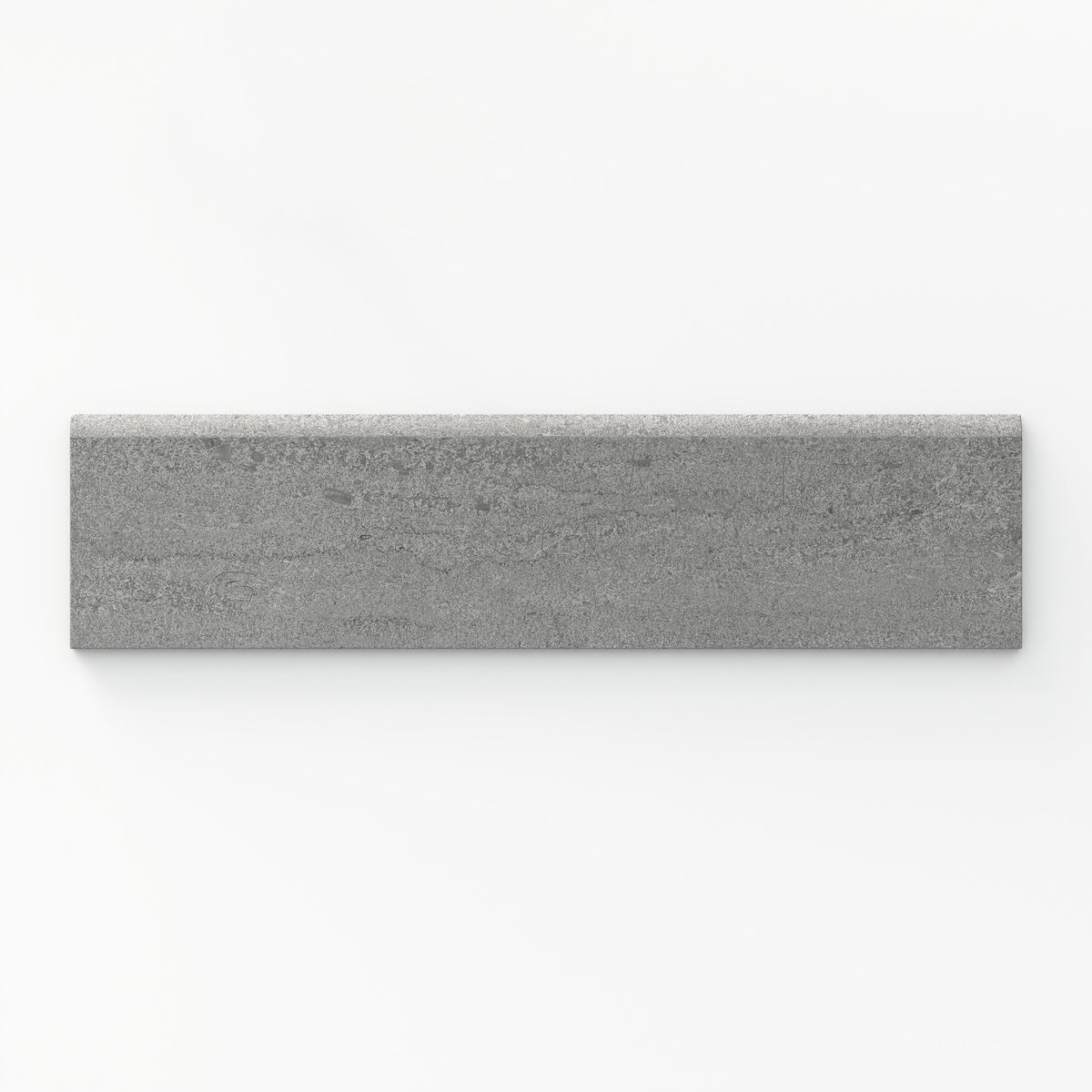Bullnose porcelain tile in bold grey tone with a matte finish, featuring a 3x12 trim and vein-cut texture, perfect for seamless edges.
