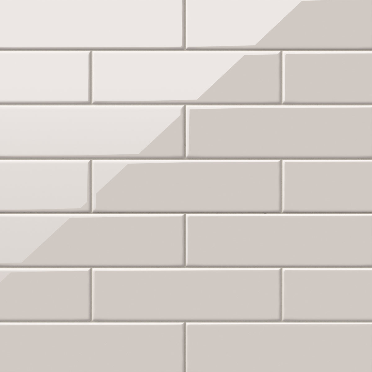 Polly Beige 3x10 glossy ceramic tiles showcasing a sleek, neutral tone with a reflective finish, perfect for creating timeless and sophisticated interiors.