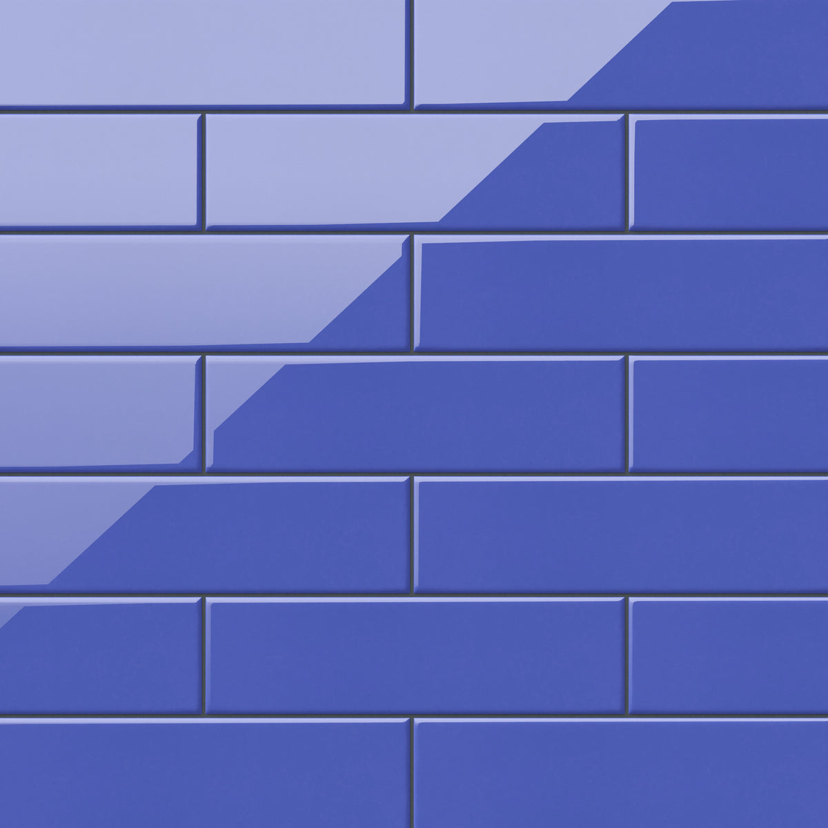 Polly Periwinkle 3x10 glossy ceramic tiles bring a playful yet refined touch with their vibrant blue hue and reflective finish, perfect for bold modern spaces.