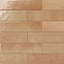 These vibrant 4x16 orange subway tiles, featuring a glossy finish and subtle tonal shifts, add a cozy yet stylish touch to contemporary or rustic interiors.
