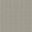 The 12x24 taupe tiles feature a vertical striped pattern in a matte finish, bringing a modern and elegant vibe to any room.