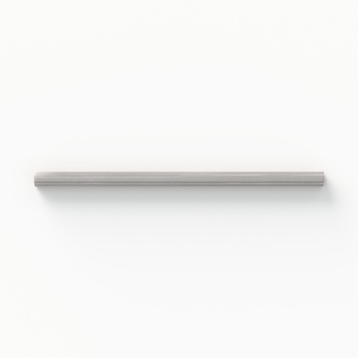 Refined fog gray pencil liner tile with a glossy finish, perfect for adding subtle elegance to walls and backsplashes