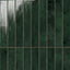 Deep forest green Jaden Hunter 2.5x16 glossy ceramic tiles, featuring a rich, reflective surface and subtle tonal variations for a dramatic and luxurious design statement.