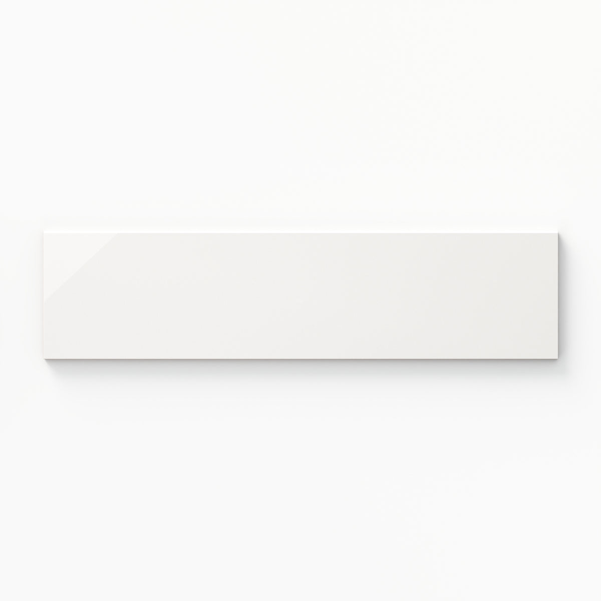Kinsley 4x16 glossy bullnose tile in cloud, featuring a polished finish and clean edge for modern elegance.