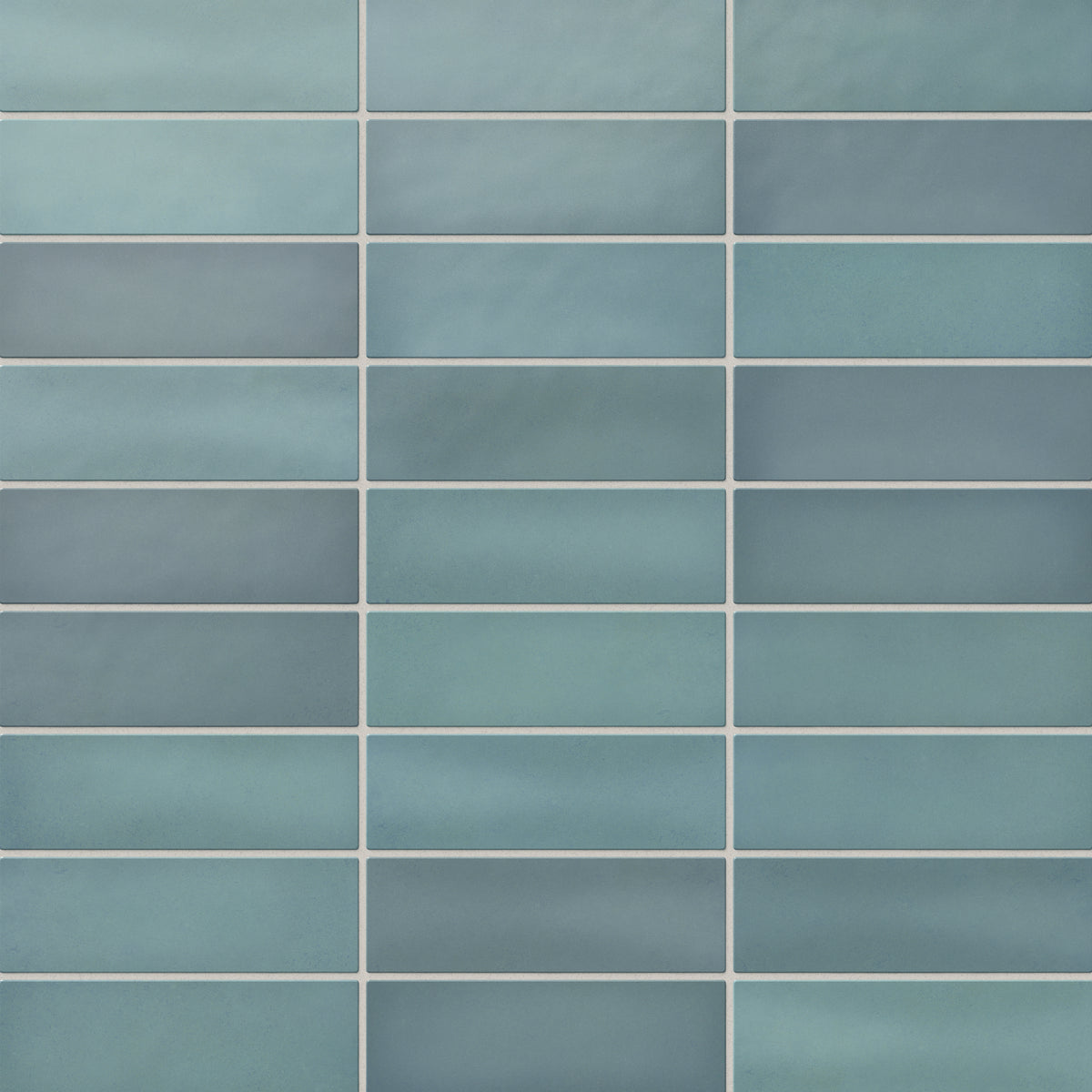 Ellie matte subway tiles in serene aqua blue tones, showcasing a smooth, handmade finish ideal for modern and tranquil spaces