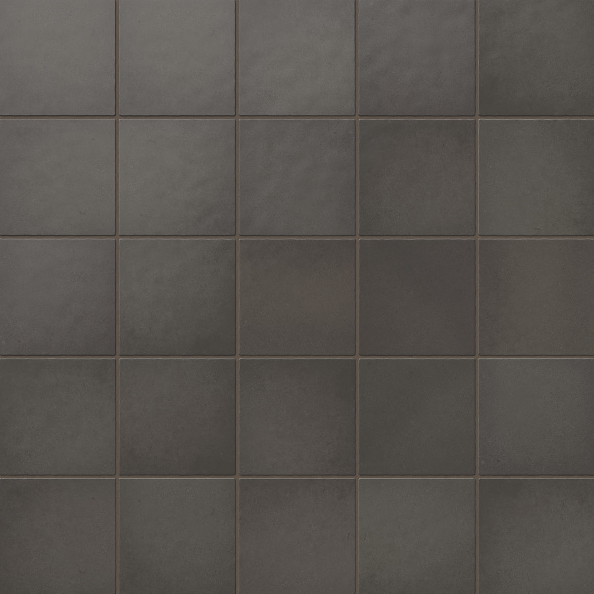 Elegant 5x5 matte ceramic tiles in deep smoke-gray hues, adding a dramatic yet refined touch to modern interiors