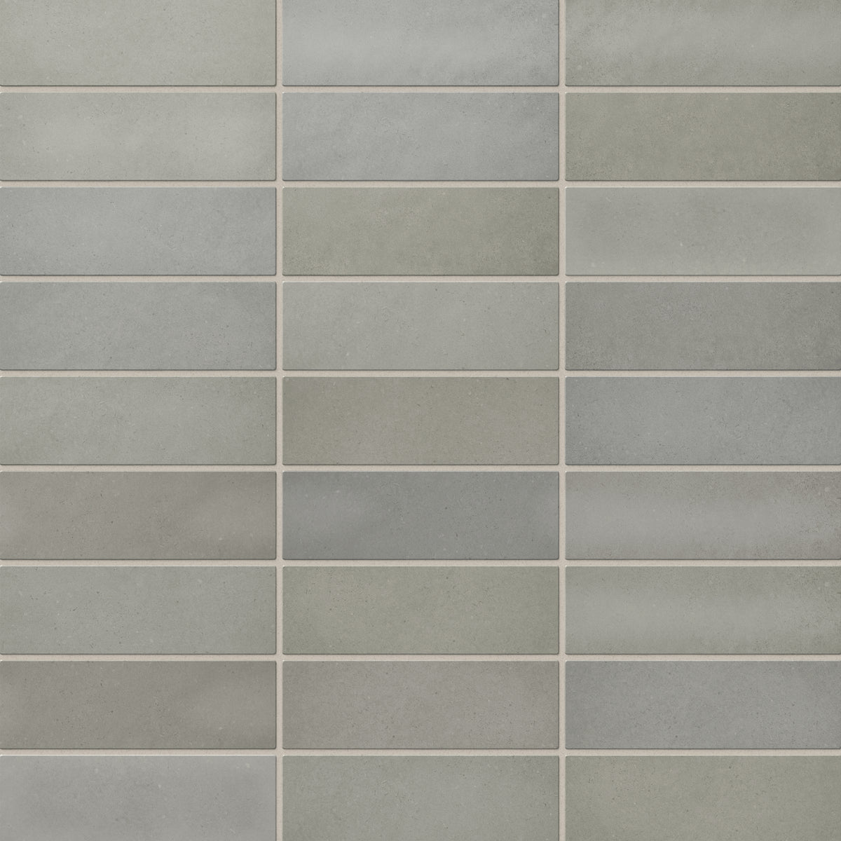 Ellie matte ceramic subway tiles in soothing gray-brown tones, perfect for creating a serene and natural ambiance in any space