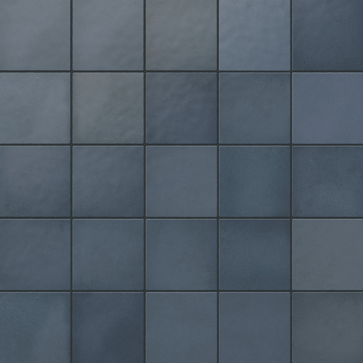 Ellie matte ceramic square tiles in deep blue hues, offering a bold and sophisticated look for walls or floors