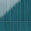 Glossy blue-green ceramic subway tiles, arranged vertically for a modern aesthetic