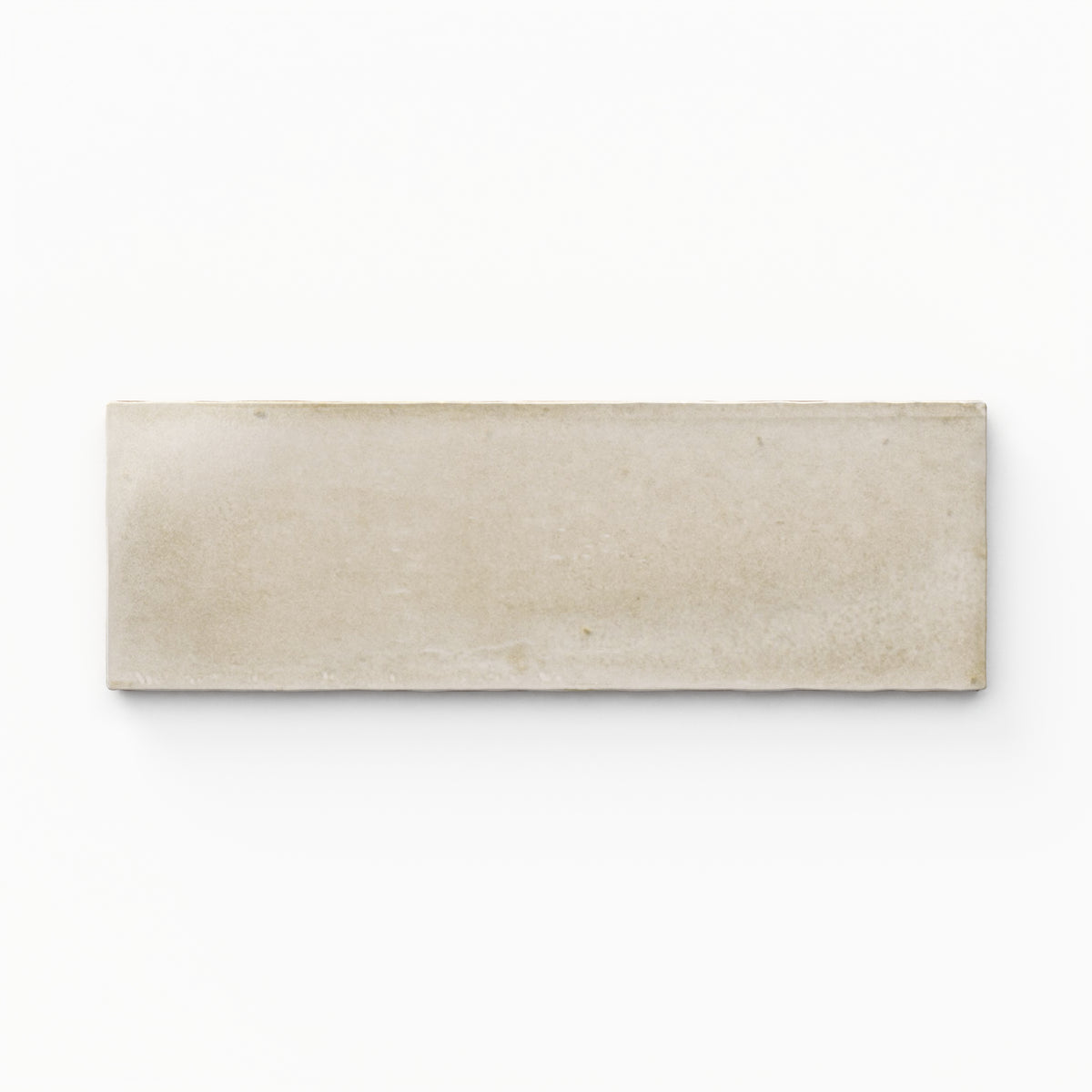 A 2x6 porcelain tile in beige, featuring a matte finish, soft tonal variation, and a clean, flat-edge profile.