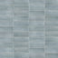 A 2x6 porcelain subway tiles in light blue, featuring a matte finish, and a clean stacked layout with fine grout lines.