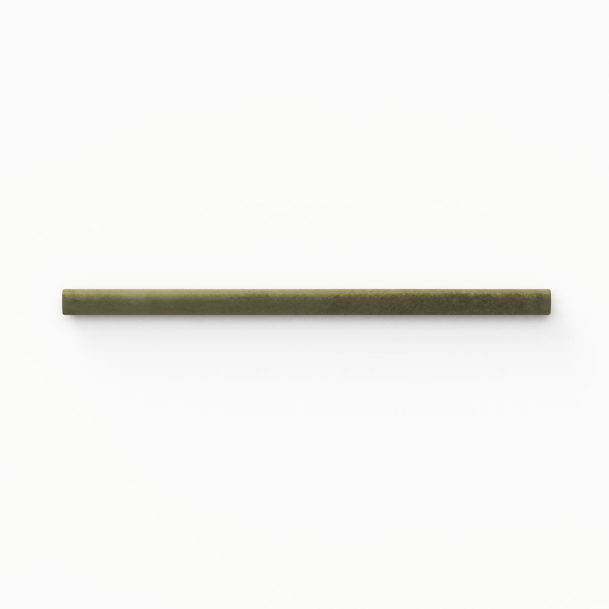 A 1x8 ceramic tile trim in moss green, featuring a matte finish, and softly curved profile for elegant edging.