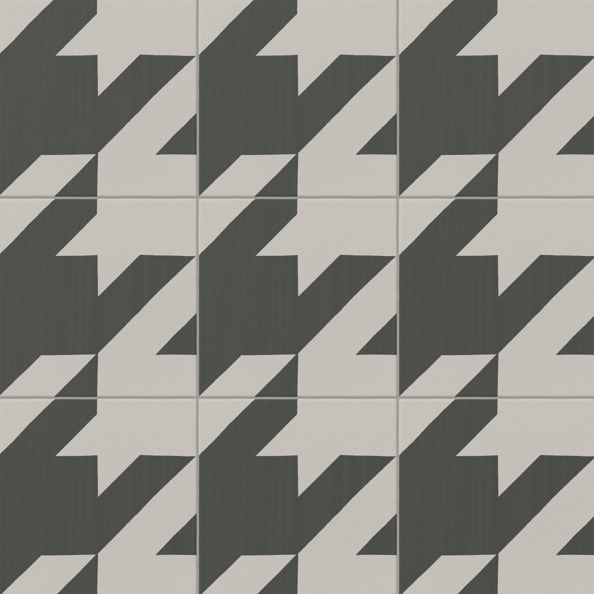 An 8x8 matte porcelain decorative tile featuring a bold houndstooth pattern in dark and light gray, creating a dynamic, oversized geometric layout.