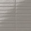 Glossy gray 2x10 subway tile with a handcrafted look, featuring subtle texture variation and a stacked layout for a refined, modern finish.