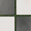 Checkerboard layout of porcelain pavers featuring deep charcoal gray and warm canvas tones, paired over trimmed grass for a clean, outdoor-ready contrast.