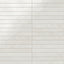 Rectangular porcelain wall tile in a glossy finish with a smooth, lightly textured surface, featuring a warm off-white color with subtle natural variation.