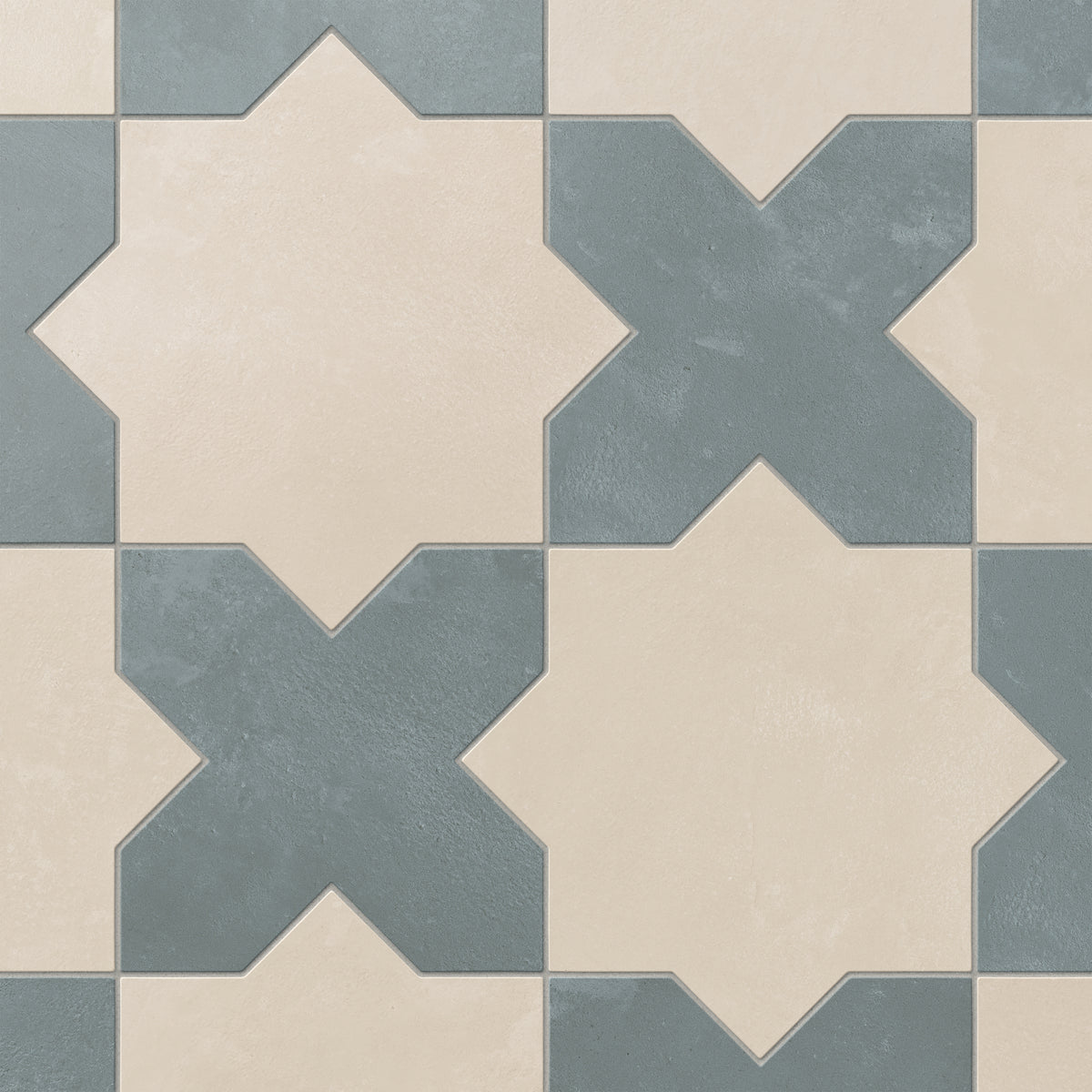 Our Isabel 11x11 Matte Porcelain Tile Star in Cream and Cross in Slate features grayish-beige and soft blue tones with a powdery matte finish for a calm heritage look suited to coastal interiors.
