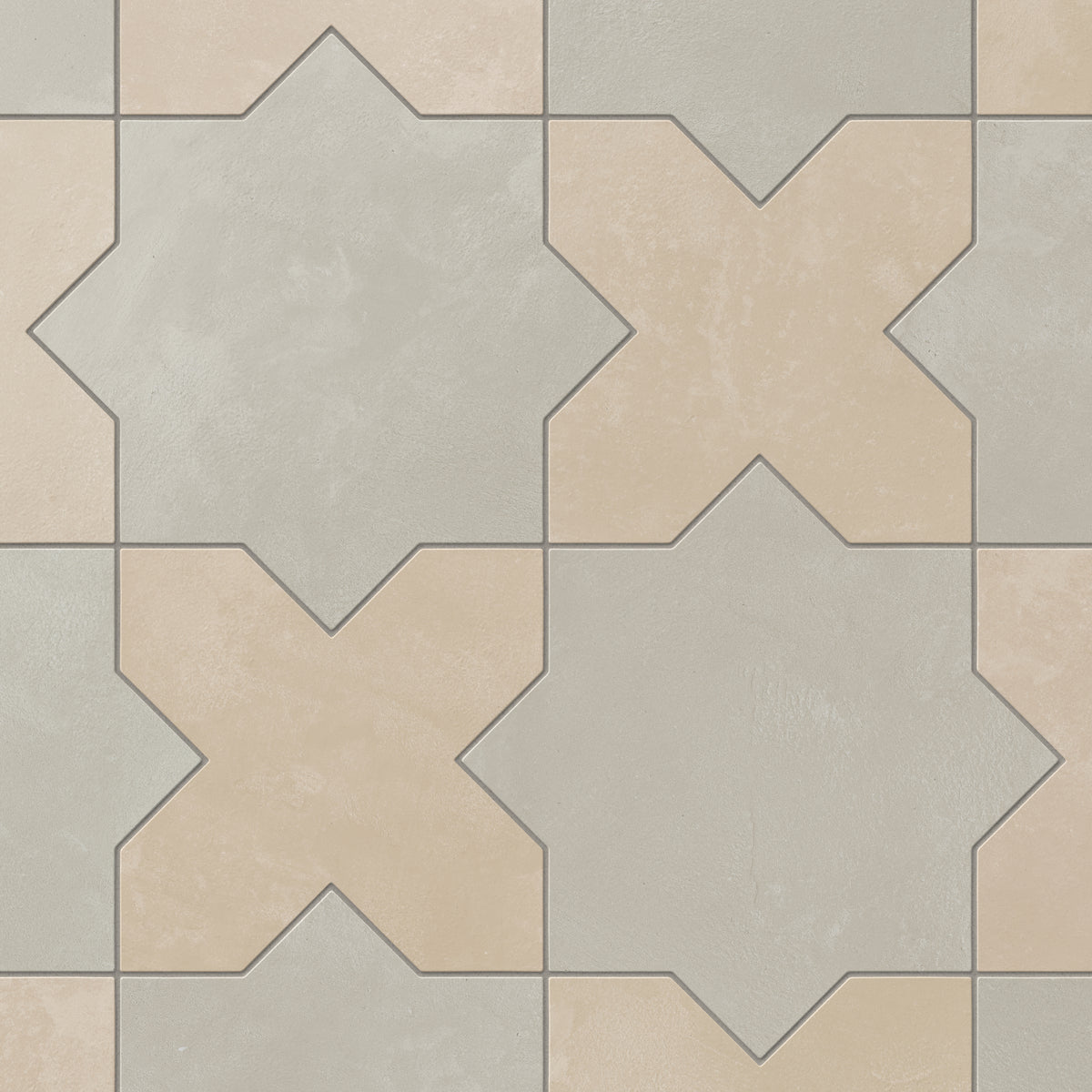Star and cross shapes move naturally across this porcelain tile, blending light gray and warm beige with a powdery matte finish and subtle cement-plaster texture inspired by handmade terracotta.
