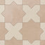A repeating star and cross pattern brings beige with soft pink undertones and grayish-beige together on this porcelain tile, finished with a powdery matte surface inspired by handmade terracotta.