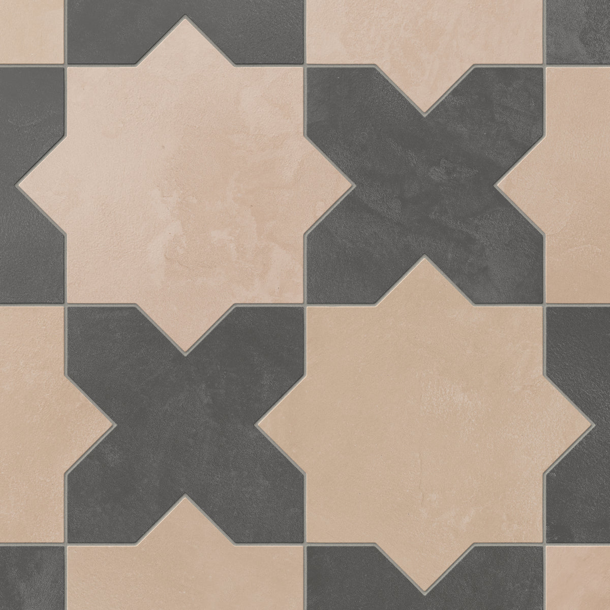 This matte porcelain tile blends star and cross forms in alternating earth-drawn hues of beige with soft pink undertones and dark gray, softened by cement-plaster texture and a handmade terracotta finish.