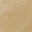 Star and cross patterned 11x11 porcelain tile in yellow-orange hues, finished with a matte surface and powdery glaze that suits rustic and Spanish-inspired spaces.