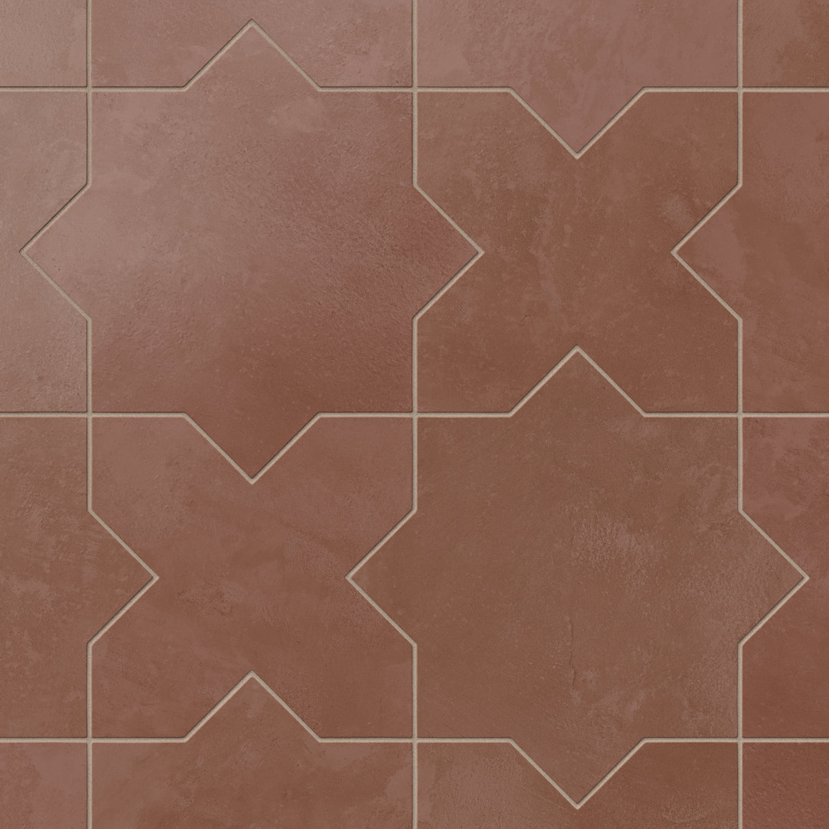 Defined by star and cross geometry, our Isabel 11x11 Matte Porcelain Tile in Rust uses layered red hues and subtle cement texture for an architectural look ideal for Spanish-style spaces.