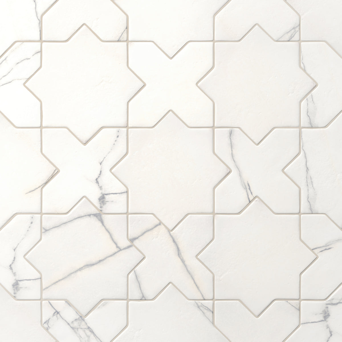 Star and cross–shaped Aslan 6x12 porcelain tiles in white blend fine gray veining with a matte surface and aged edges, making a calm choice for accent walls.
