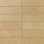 Yellow-orange 2x6 porcelain subway tiles carry gentle, earth-drawn variation and a powdery matte surface, laying out smoothly for backsplashes and interior walls.
