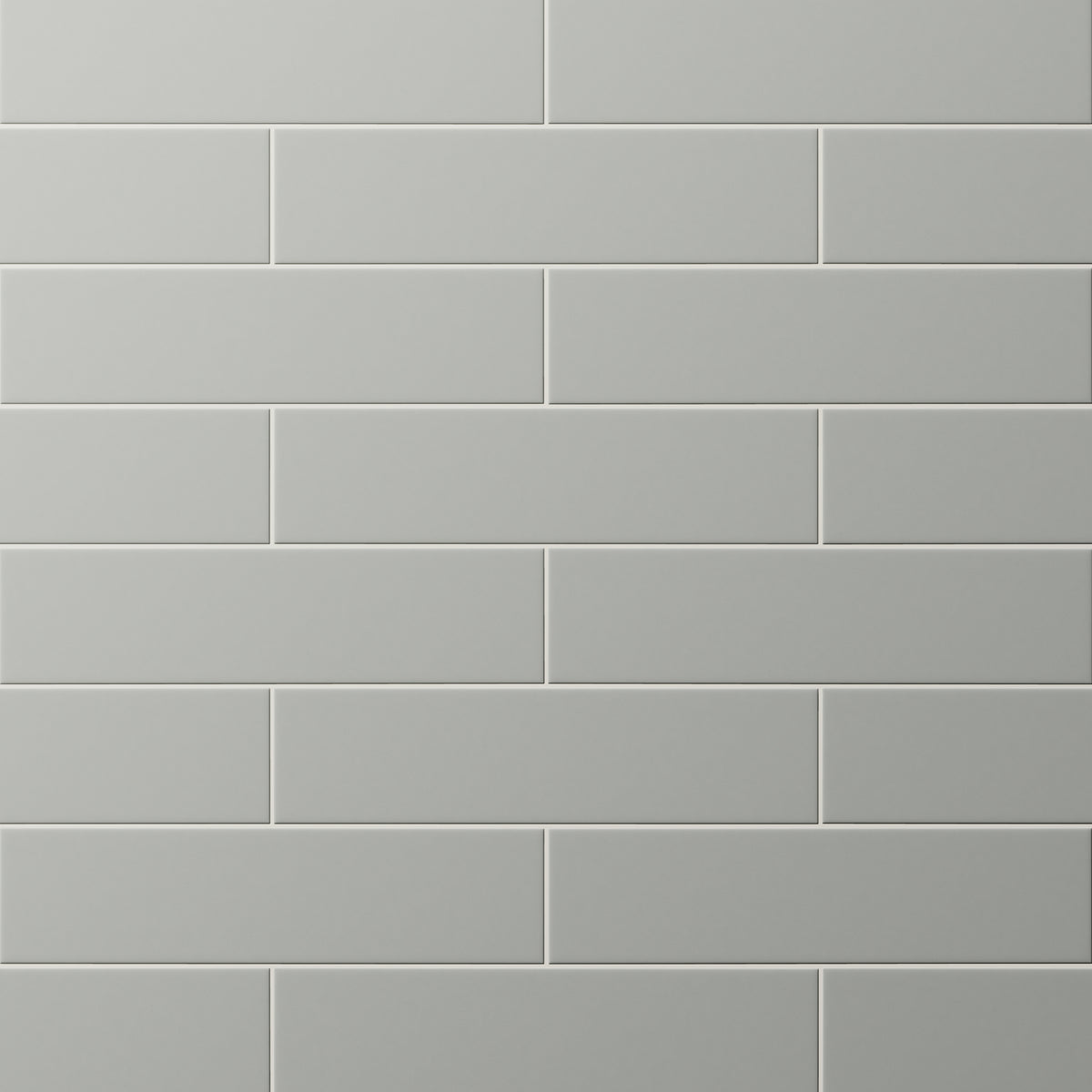 Matte earthy gray subway tiles in a classic offset layout, offering a sleek, modern look with subtle sophistication.